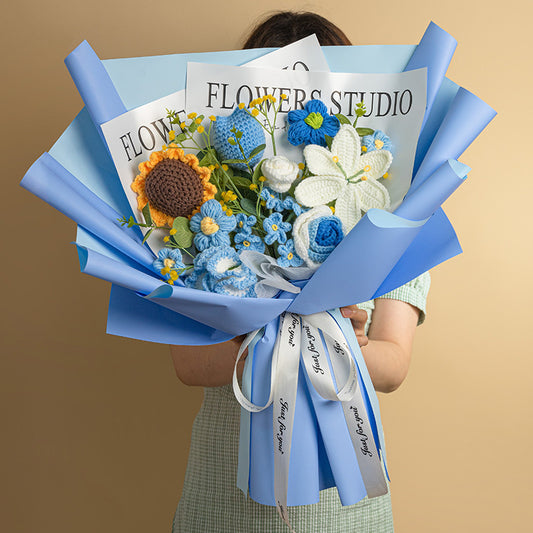 Knitted Wool Bouquet Finished Product featuring a colorful assortment of flowers in blue wrapping.