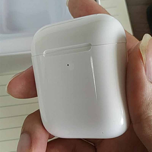 i80 TWS Bluetooth Earbuds with Wireless Charging charging case held in hand
