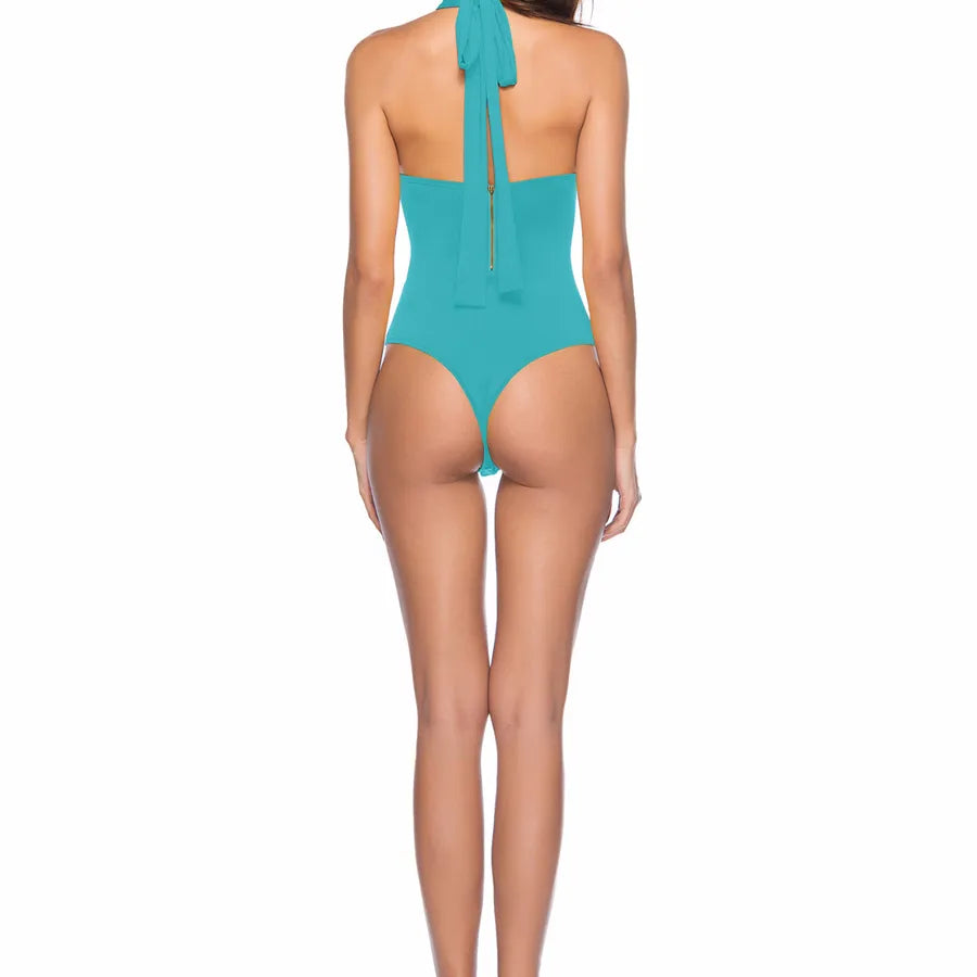 Backless Strappy Irregular Jumpsuit in blue, showcasing a stylish back design and elegant strappy details.