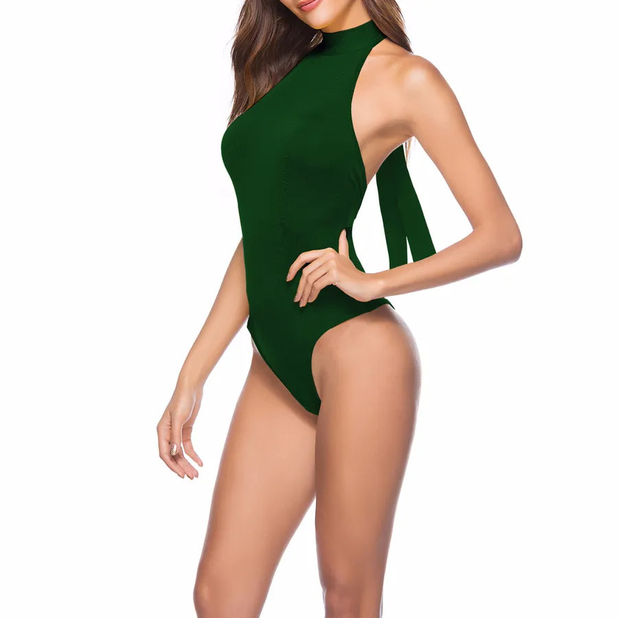 Backless Strappy Irregular Jumpsuit in green, featuring a unique high-neck design and open sides.