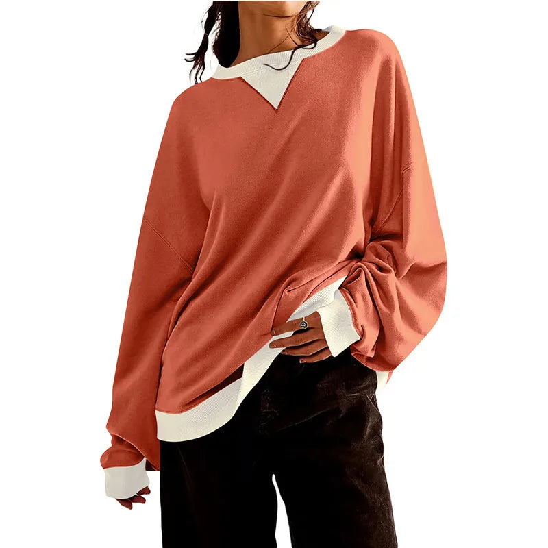 Loose Casual Contrast Color Sweater For Women displayed on a model, featuring a relaxed fit and stylish color contrast.