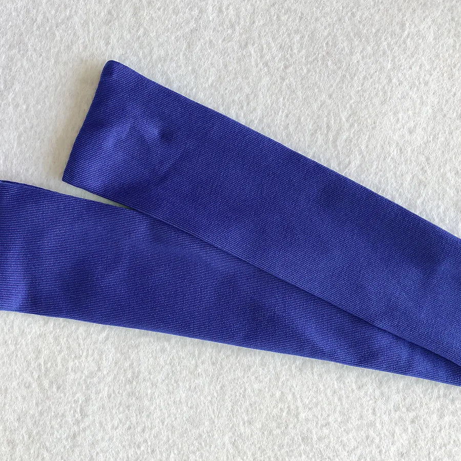 Backless Strappy Irregular Jumpsuit detail showing blue fabric strips