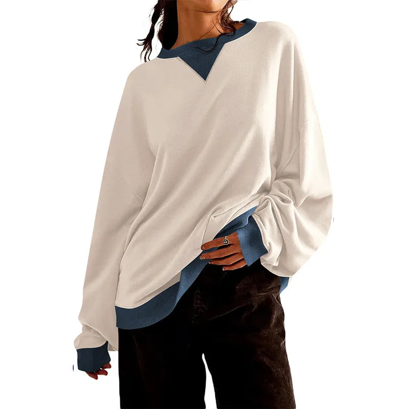 Loose Casual Contrast Color Sweater For Women displayed on a model, featuring a stylish white and blue design.