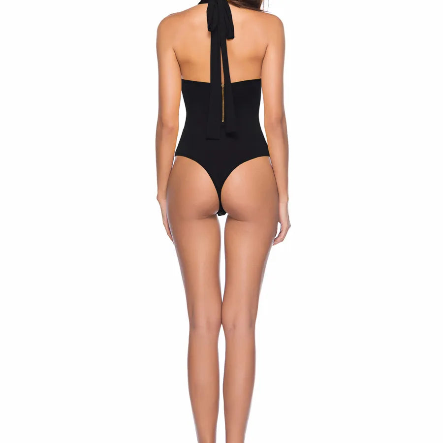 Backless Strappy Irregular Jumpsuit worn from the back, showcasing a stylish black design with a tie at the neck.