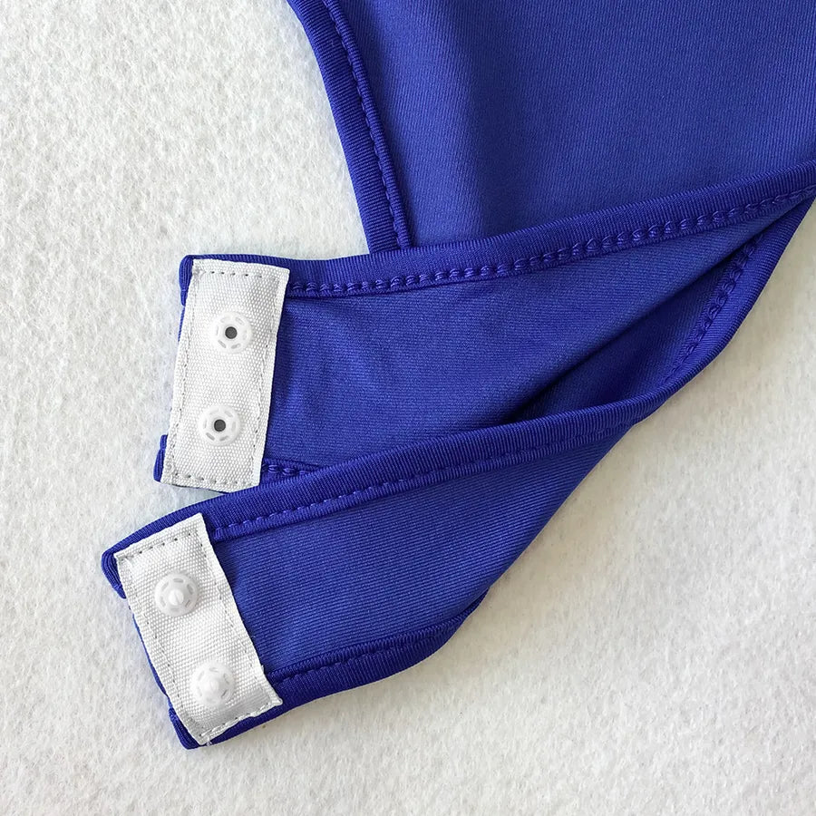 Close-up of the cuffs of a Backless Strappy Irregular Jumpsuit featuring button details.