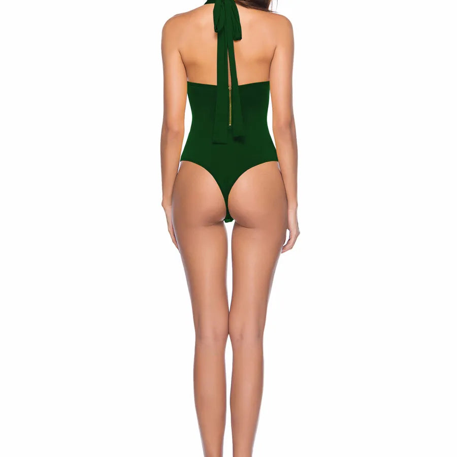 Backless Strappy Irregular Jumpsuit in green, showcasing the back design with a bow detail.