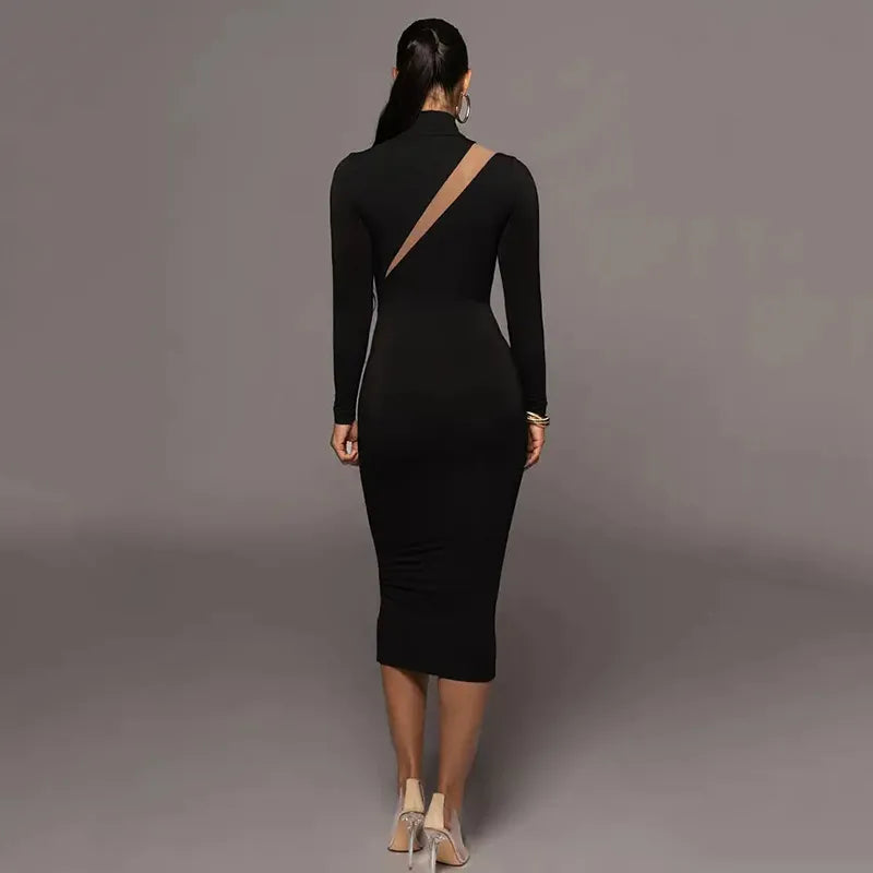 Back view of a woman wearing a Round Neck Long Sleeve Stitching Dress Women in black, showcasing its chic design.